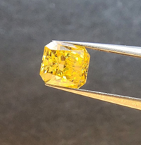 Figure 2 - 0.31 carat, fancy colour, rectangular radiant cut diamond from the Q1-4 kimberlite, Naujaat Project, Nunavut.